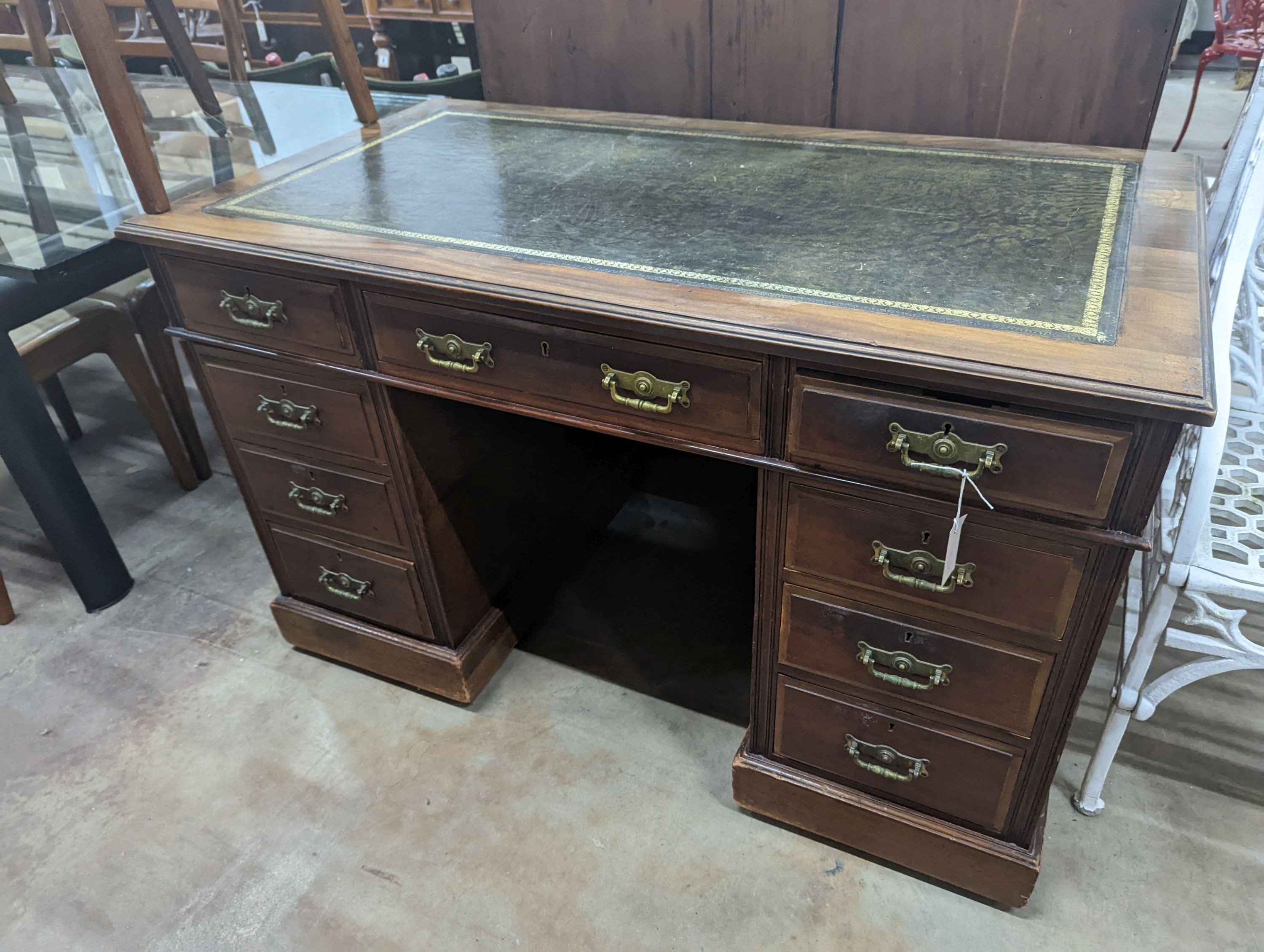 A late Victorian walnut pedestal desk, length 122cm, depth 68cm, height 76cm